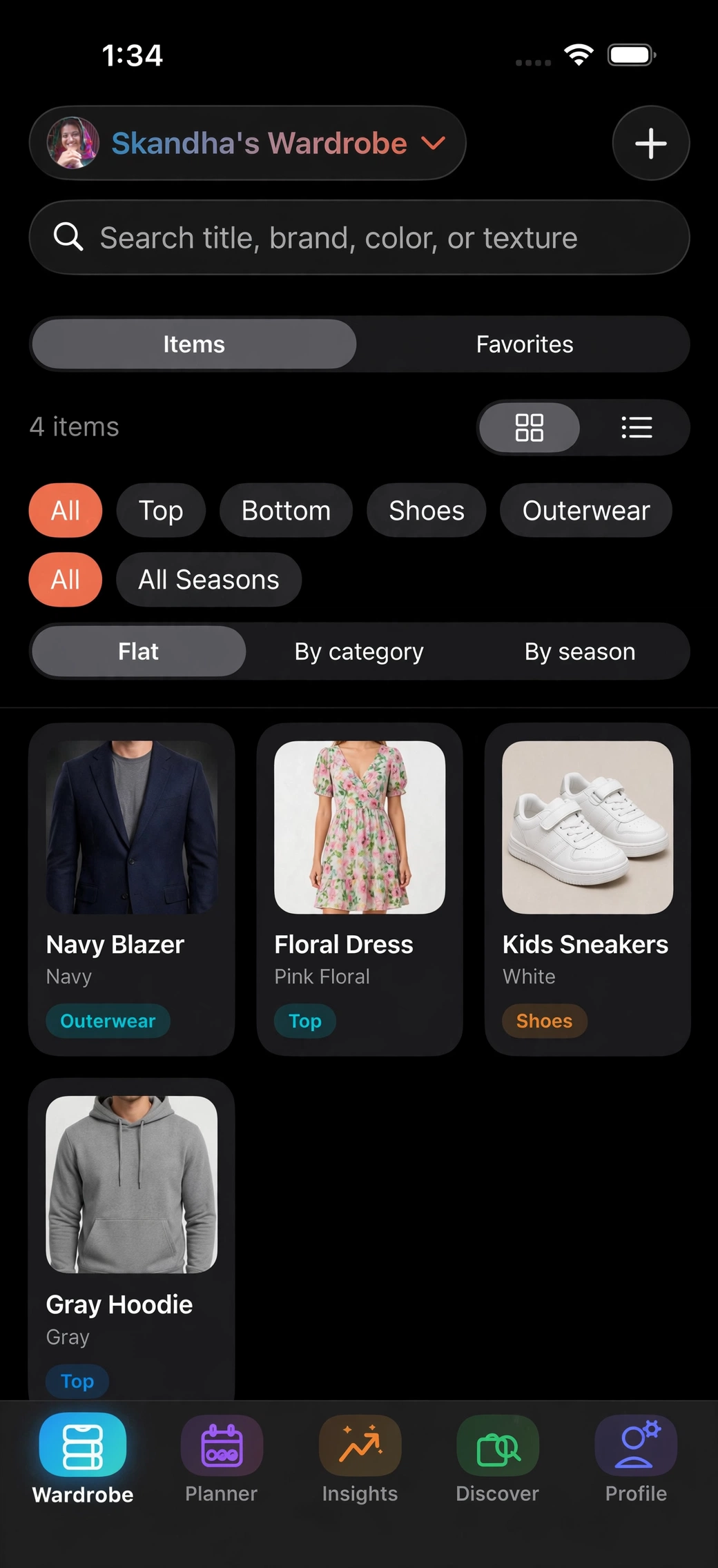 DressClan wardrobe grid with clothing items organized by category